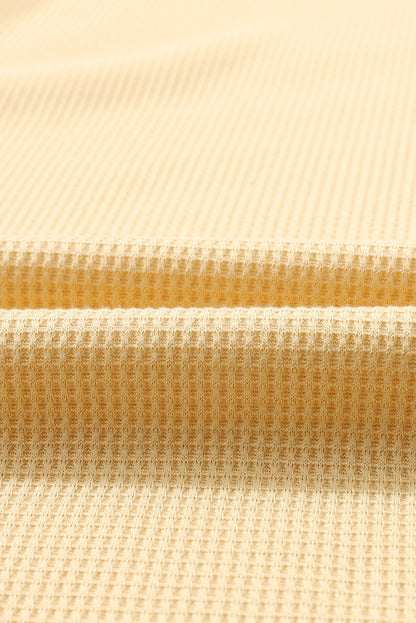 Top de manga larga con botones de punto tipo gofre marrón 