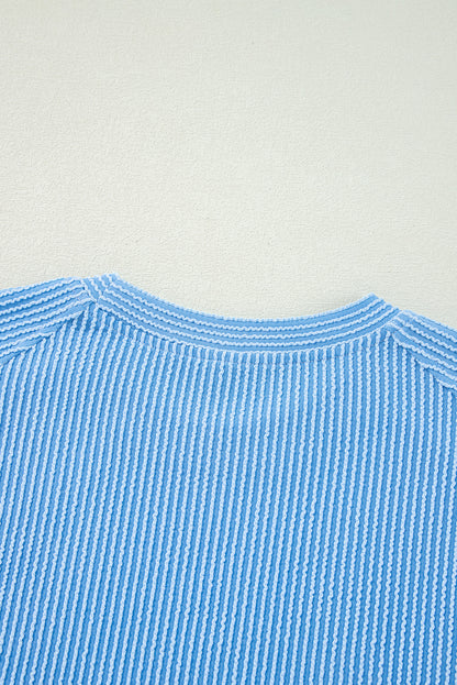 Ensemble t-shirt à manches courtes et pantalon large en tricot côtelé bleu uni