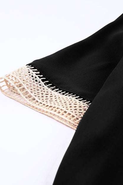 Chemisier à manches courtes et col en V avec bordure en dentelle