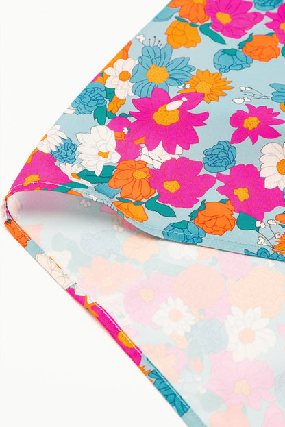 Robe babydoll bleu ciel à imprimé floral, col fendu, manches bouffantes