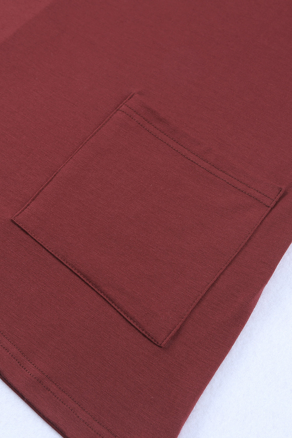 Tunique à manches courtes avec poches latérales 