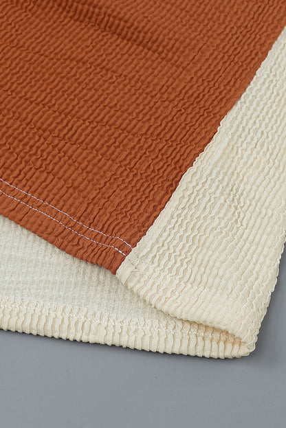 Top de manga larga acanalado con bloques de color patchwork