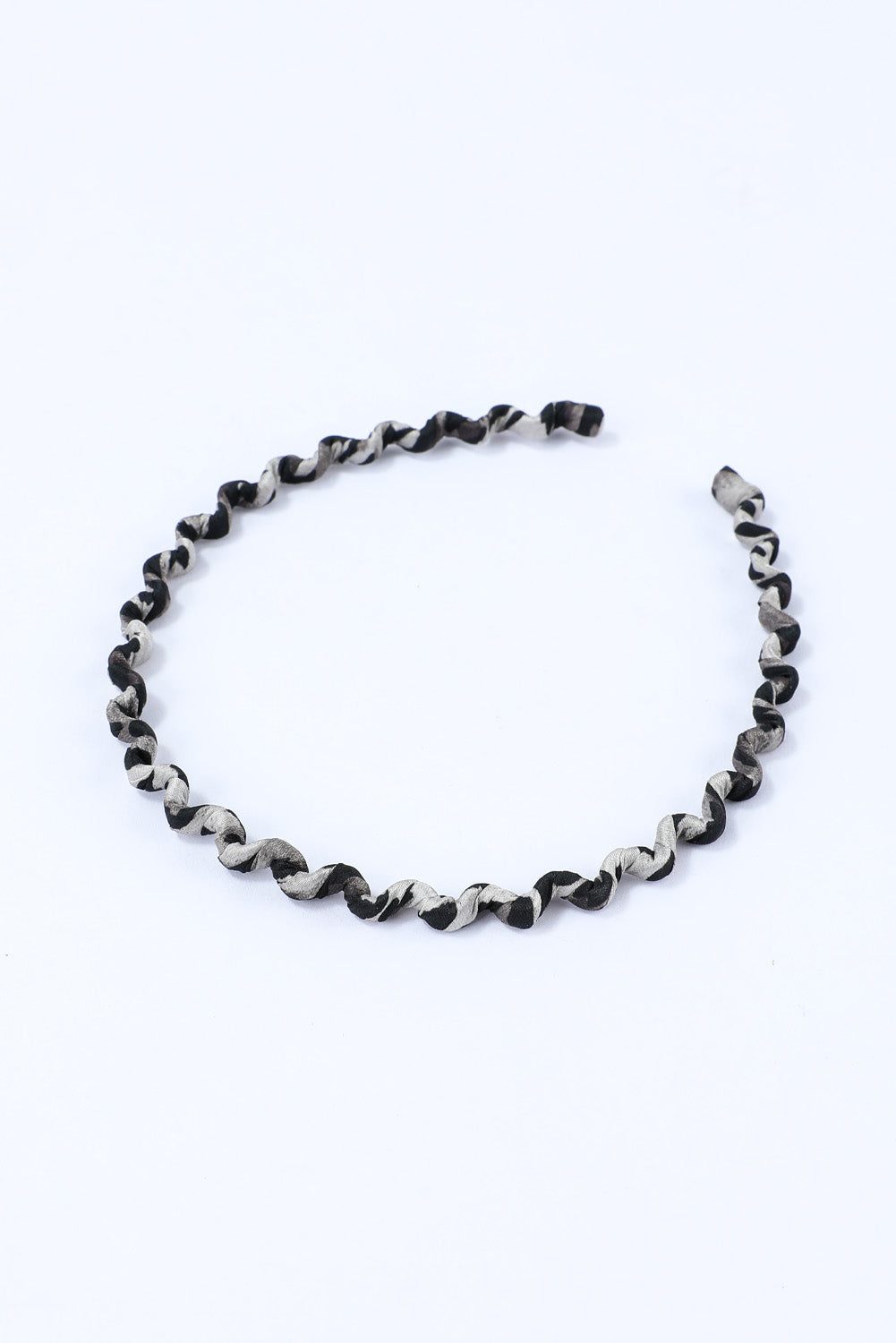 Diadema ondulada con estampado de leopardo vintage negro 