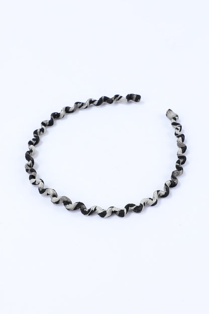 Diadema ondulada con estampado de leopardo vintage negro 