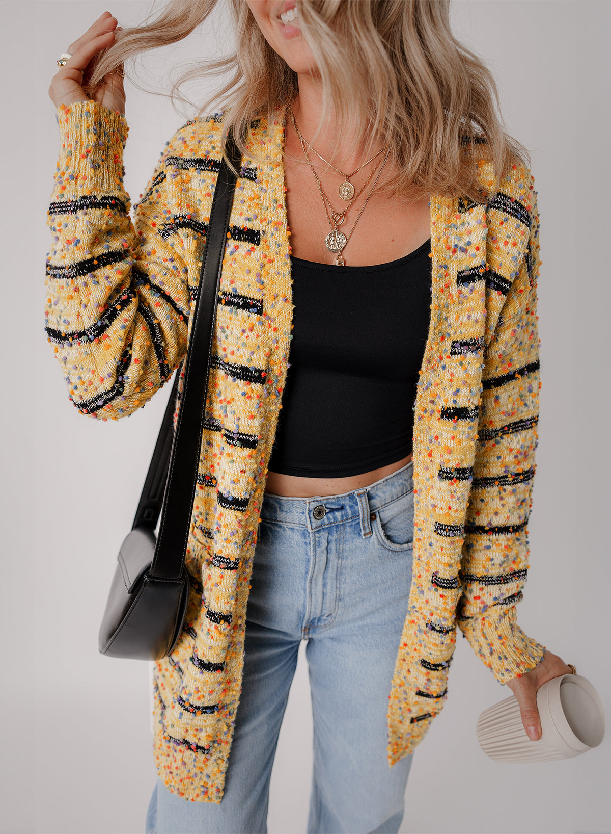 Cardigan long ouvert sur le devant en tricot à pompons et rayures beiges