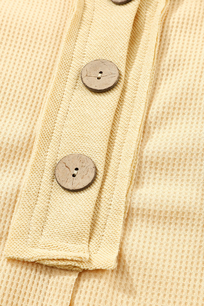 Top de manga larga con botones de punto tipo gofre marrón 