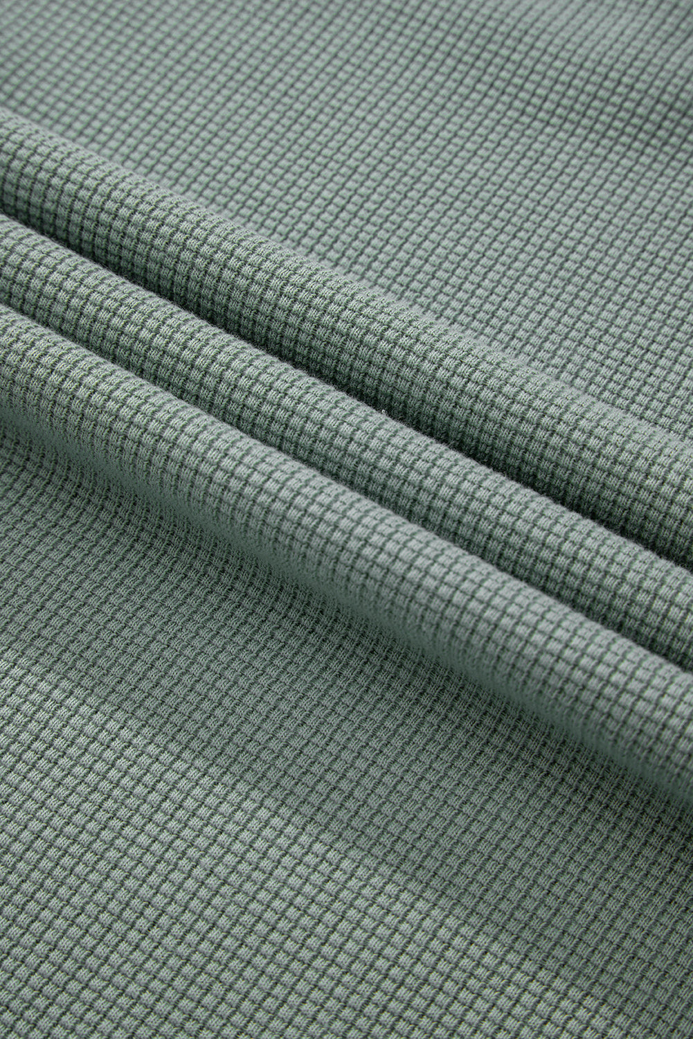 Haut à col en V et épaules tombantes en tricot gaufré Clearly Aqua