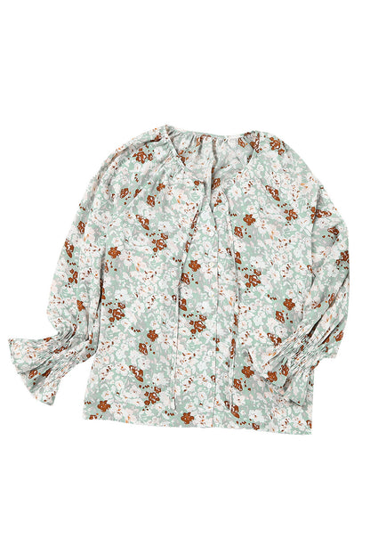 Blusa con botones y cuello en V con estampado floral 