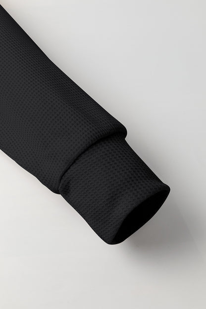 Sweat à capuche surdimensionné noir en tricot gaufré doublé polaire