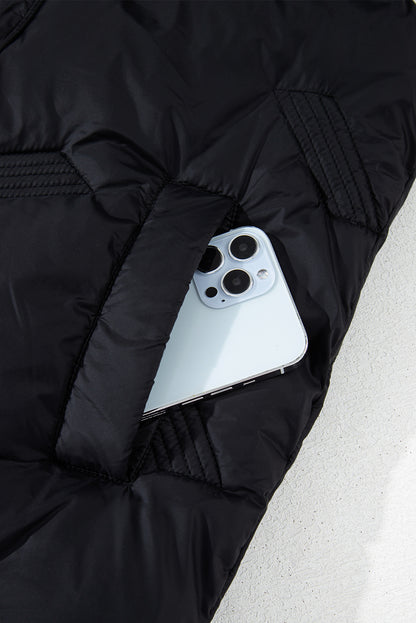 Veste matelassée noire à col montant et fermeture éclair