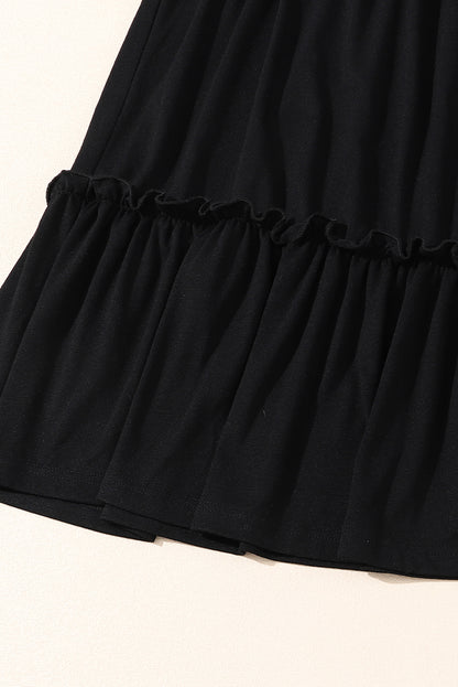 Robe noire grande taille à volants et manches patch léopard rayées 