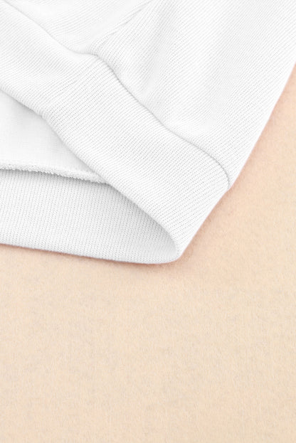 Pull violet en tricot à col en V et poignets boutonnés