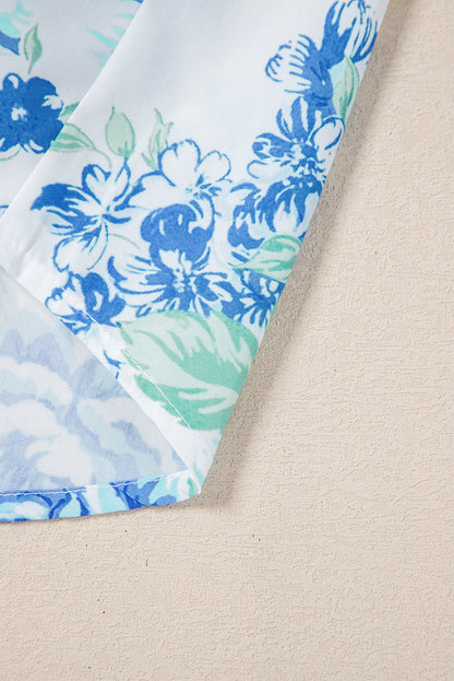 Chemise boutonnée à volants et imprimé floral bleu ciel