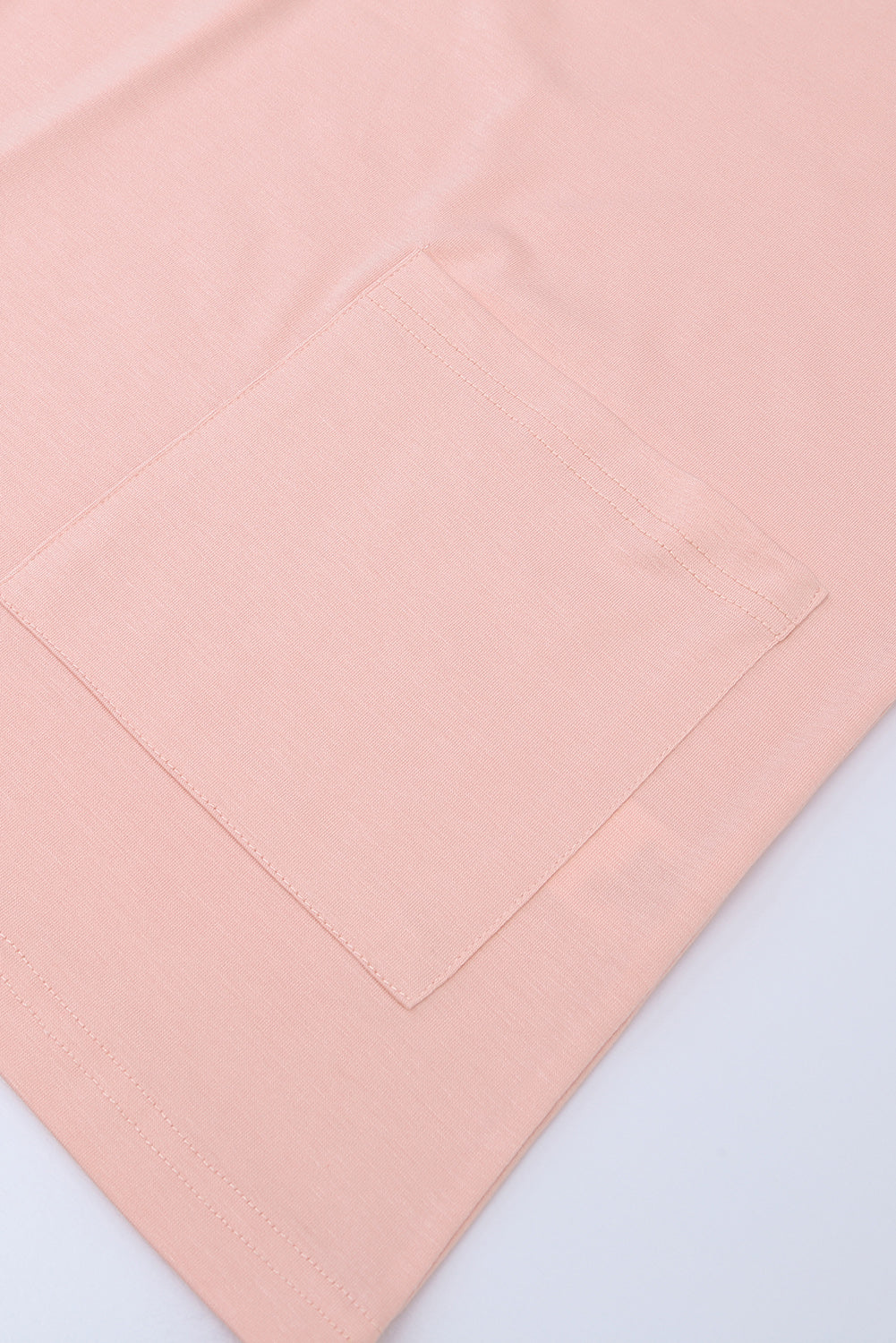 Tunique à manches courtes avec poches latérales 