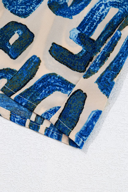 Mini-robe boutonnée à manches bouffantes et imprimé abstrait beige