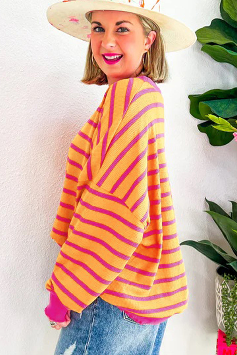 Pull ample à rayures orange, col rond, épaules tombantes