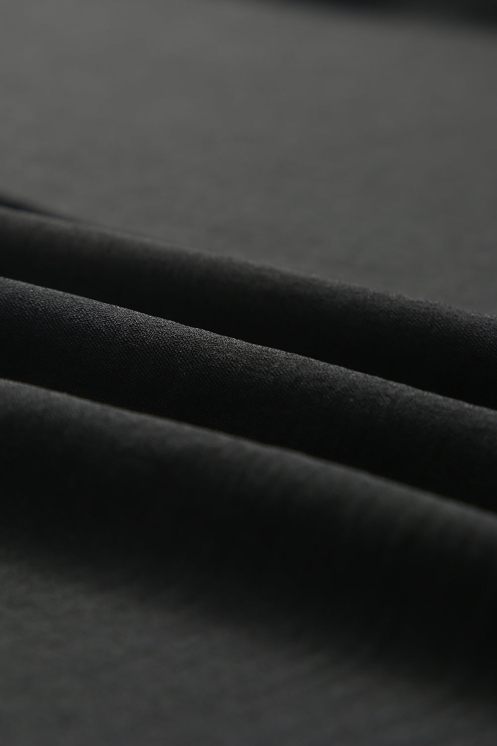 Top tipo cambio de muñeca fruncido