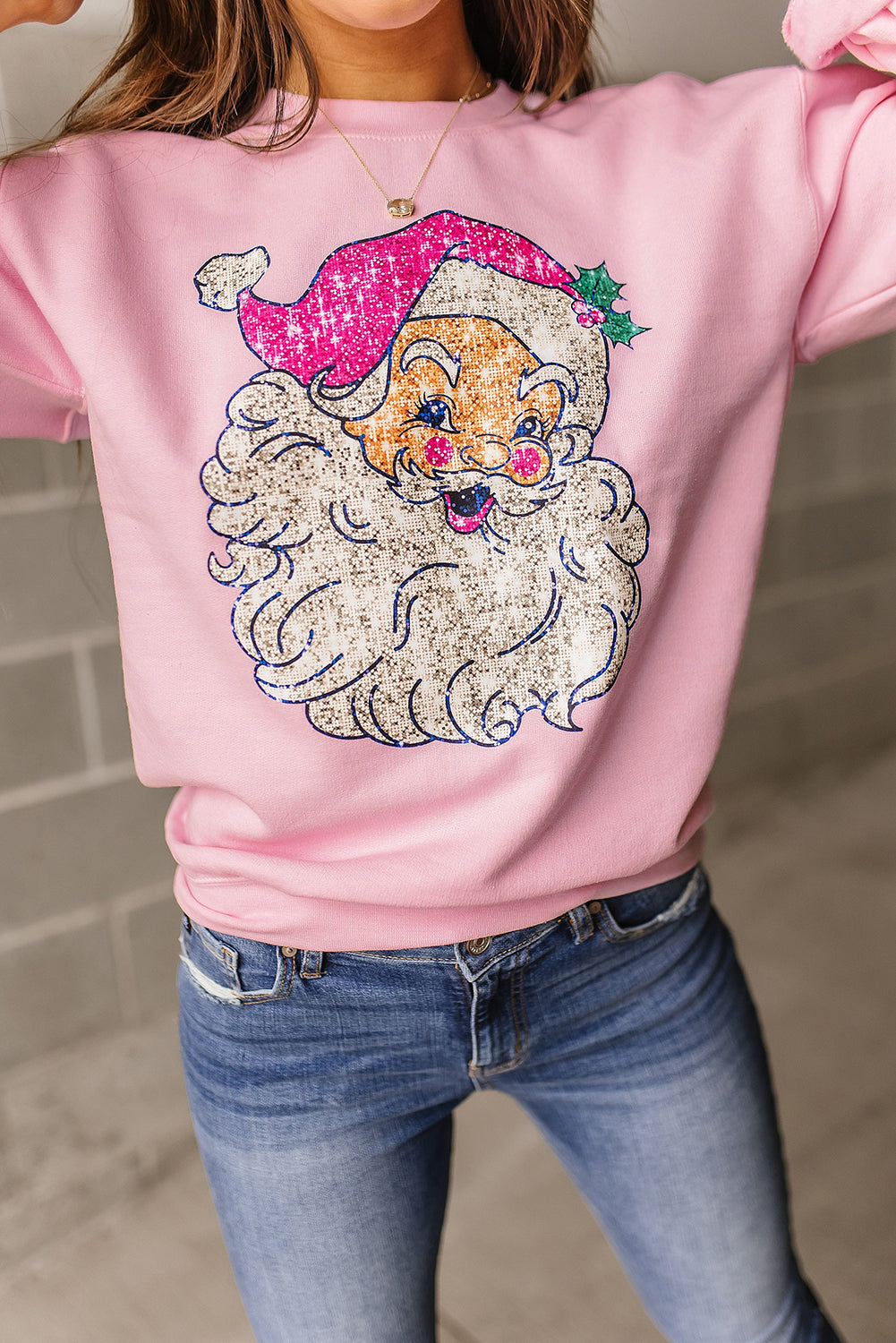 Sweat-shirt rose à épaules tombantes et motif Père Noël audacieux