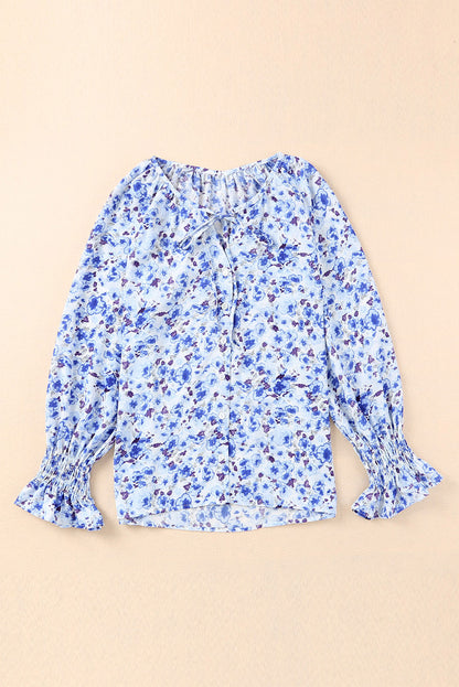 Blusa con botones y cuello en V con estampado floral 