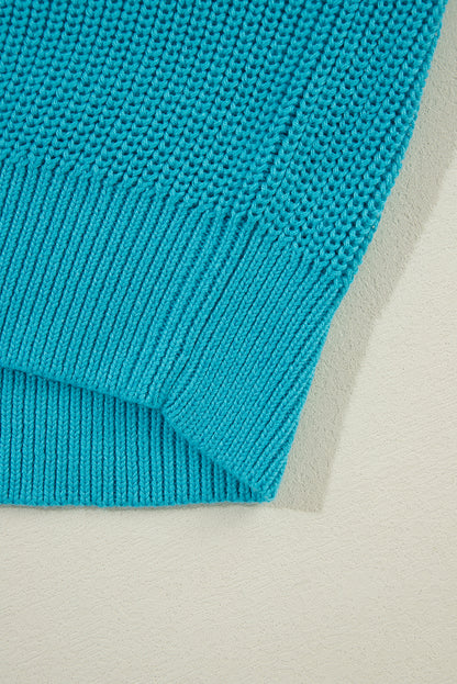 Pull turquoise à volants et manches bouffantes
