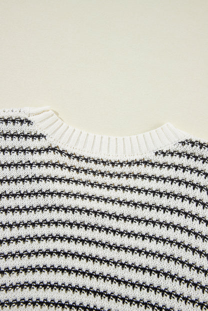 Gilet en tricot ample à rayures noires et bordures côtelées