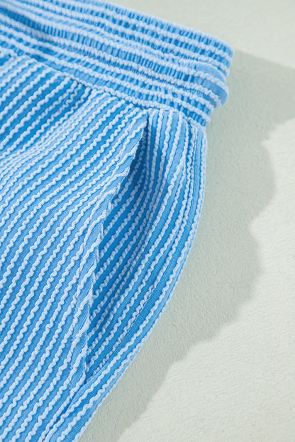 Ensemble t-shirt à manches courtes et pantalon large en tricot côtelé bleu uni