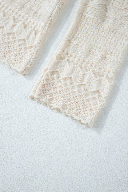 Chemisier blanc à manches longues et boutons en dentelle géométrique