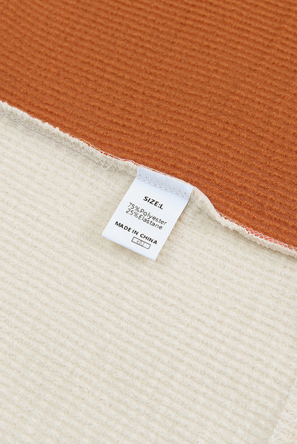 Top de manga larga acanalado con bloques de color patchwork