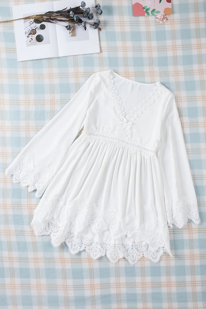 Chemisier à manches cloche et empiècements en crochet