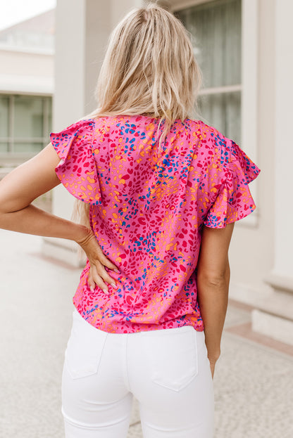 Chemisier à imprimé léopard, col en V et manches flottantes 