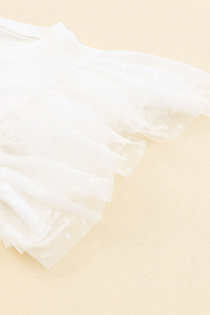 Haut en maille côtelée à volants et manches en maille à pois