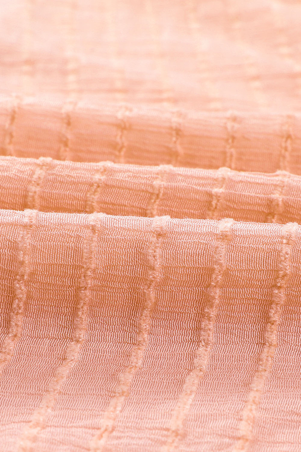 Chemisier péplum texturé noué sur le devant 