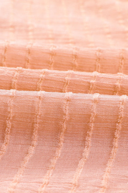 Chemisier péplum texturé noué sur le devant 