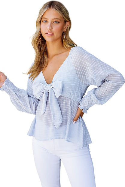 Chemisier péplum texturé noué sur le devant 