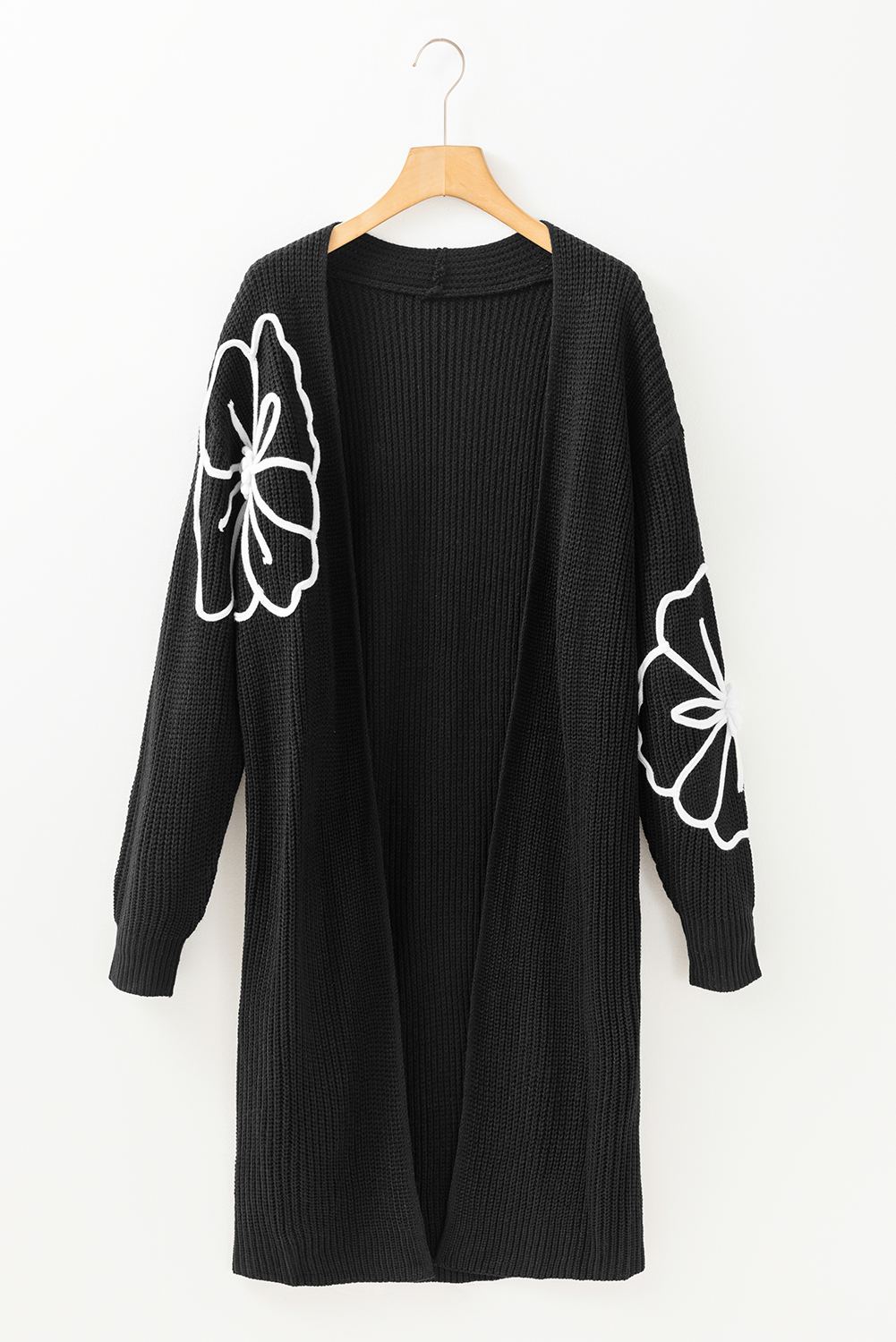 Cardigan ouvert sur le devant à épaules tombantes et broderies de fleurs noires