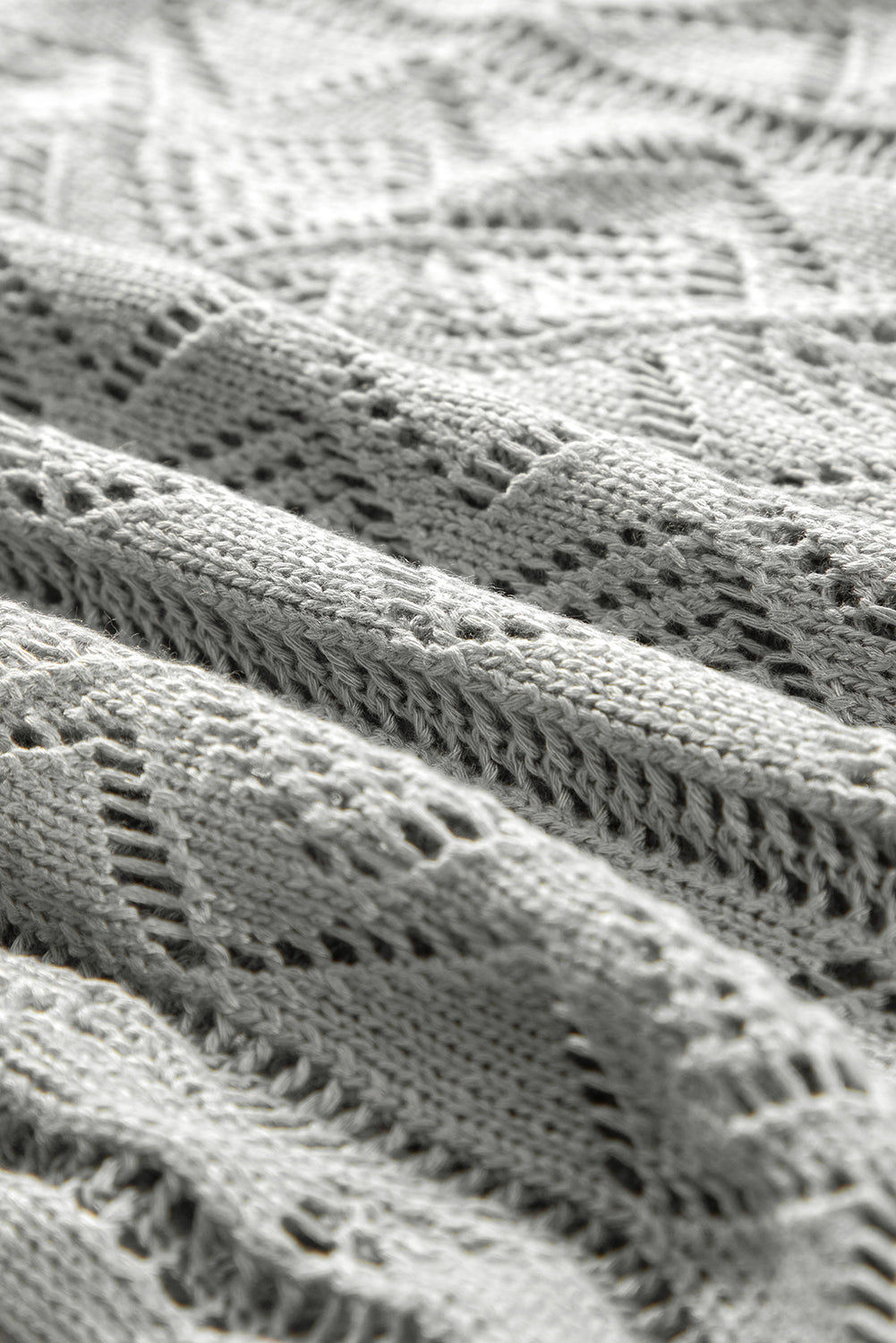 Cardigan long gris à boutons ajourés sur le devant