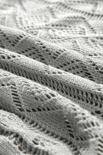 Cardigan long gris à boutons ajourés sur le devant