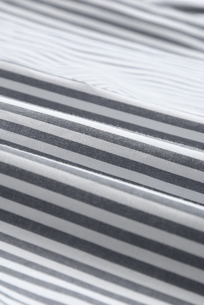 Camisa de manga larga con botones y bolsillos a rayas