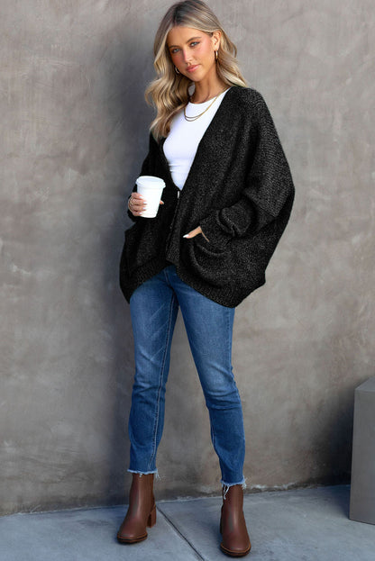 Cardigan gris à poches sur le devant et boutons 