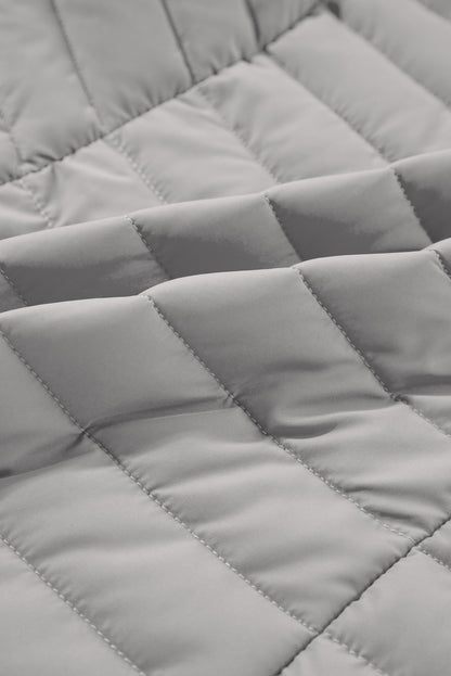 Gilet matelassé zippé à col en peluche argentée