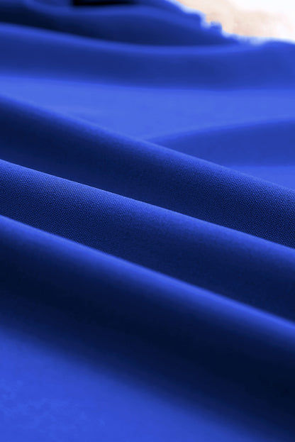 Chemisier à manches courtes et col en V avec bordure en dentelle