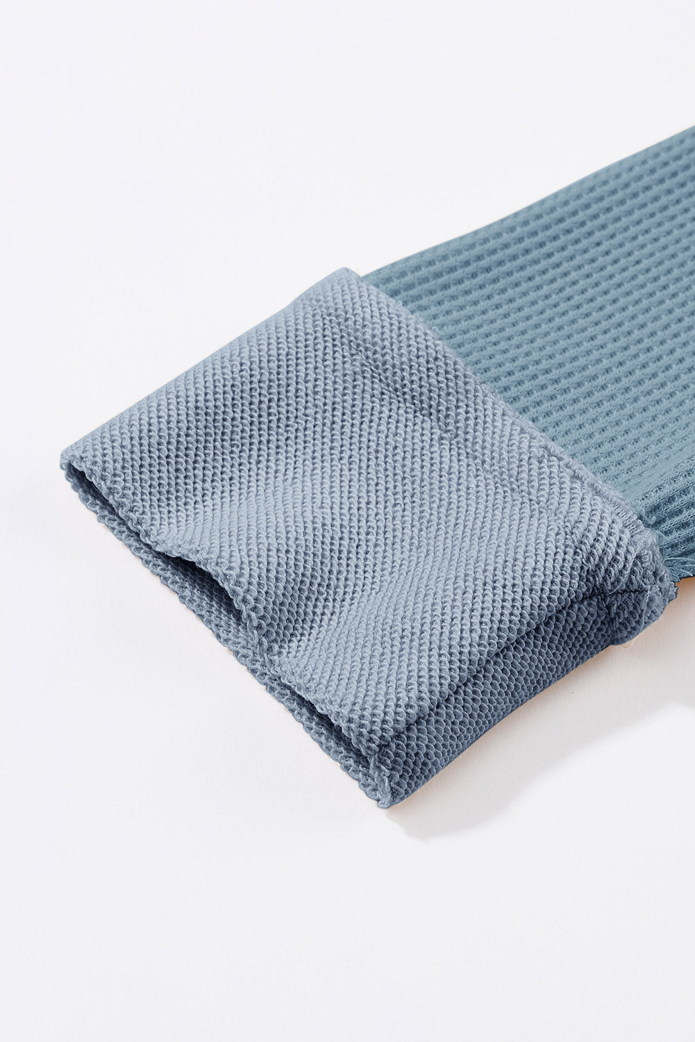 Top de manga larga con botones de punto tipo gofre marrón 