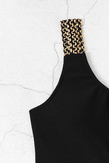 Maillot de bain une pièce noir texturé à découpes asymétriques 