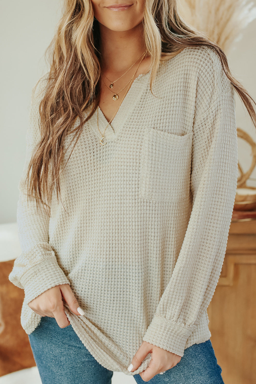 Haut ample en tricot gaufré à col fendu et poches