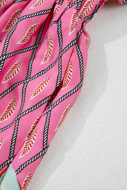 Combinaison taille haute à col en V et imprimé géométrique cachemire rose