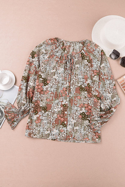 Blusa con botones y cuello en V con estampado floral 