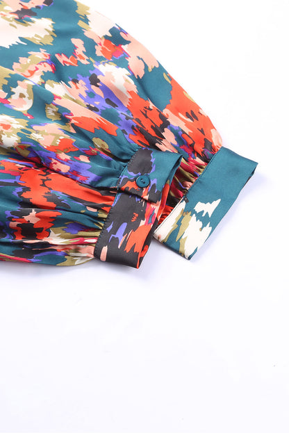 Blusa con mangas abullonadas y cuello en V con estampado de grafiti 