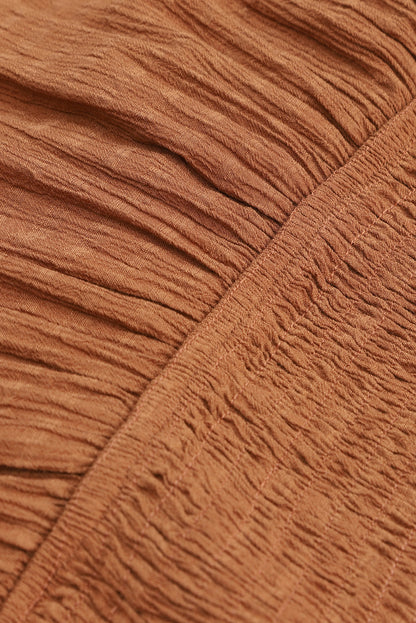 Mini-robe noire à volants et manches évasées 