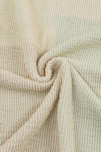 Top de manga larga acanalado con bloques de color patchwork