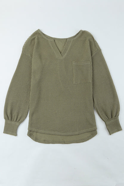 Haut ample en tricot gaufré à col fendu et poches